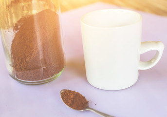 Coffee cup and beans on a white background.