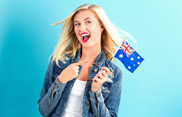 Young woman holding Australian flag