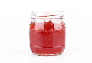 fresh strawberry jam in glass bottle with mint leaf