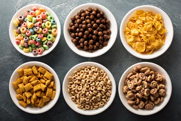 Tuinposter Variety of cold cereals in white bowls © fahrwasser