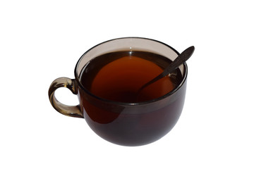 cup of black tea with sugar and spoon