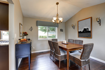 Elegant dining room accented with wicker chairs