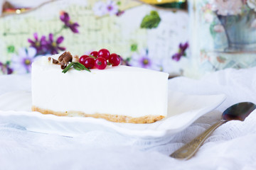 Vanilla cheesecake on a white runner