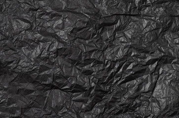 Текстура мятой  чёрной бумаги. © elizalebedewa