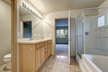Naklejka na ściany i meble Grey bathroom interior with double sink wood vanity cabinet