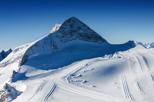 Sunny view of Austrian Alps from viewpoint of ski resort Zillertal Hintertuxer Glacier, Tirol, Austria.