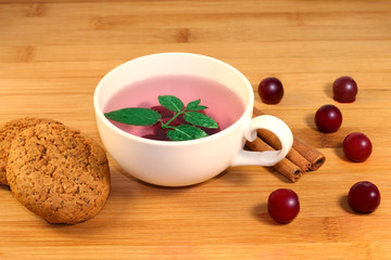 Cherry tea with Mint, cookies and cinnamon