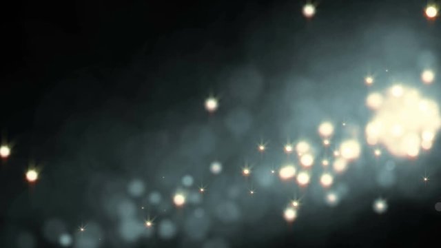 Many particles flying in the air. Looped video background.