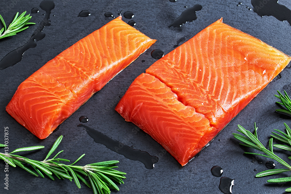 Wall mural salmon fillet and drops of olive oil