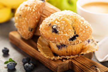 Blueberry and banana muffins with coffee for breakfast