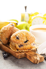 Blueberry and banana muffins with coffee for breakfast