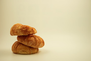 Tasty croissants on white background