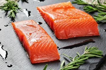 salmon fillet and drops of olive oil