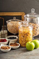 Cereal bar or buffet wih cornflakes, fruit and nuts