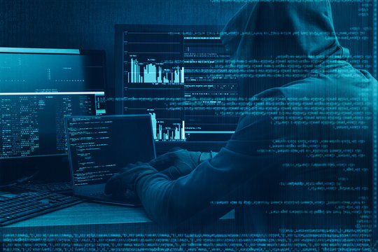 Internet crime concept. Hacker working on a code on dark digital background with digital interface around. - Powered by Adobe