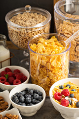 Cereal bar or buffet wih cornflakes, fruit and nuts
