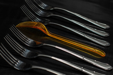 Abstract concept with forks Someone  is not such as all