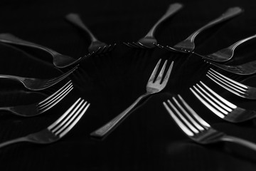 Abstract idea with forks Someone  is not such as all
