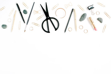 Home office workspace with scissors, clips and female accessories. Flat lay, top view. Blog header or hero.