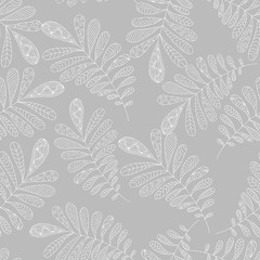 Naklejka premium Seamless abstraction background delicate leaves on a white background