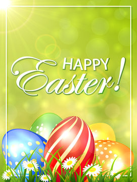 Green Easter background with colored eggs