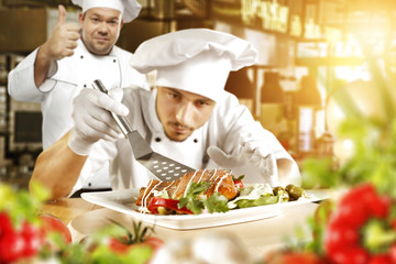 cook chef and food in kitchen 