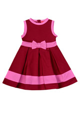 Beautiful claret summer dress with a graceful pink bow for girls of school age. Isolated on a white...