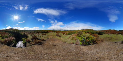 360° spherical panorama: standing on a bridge over a levada on an open-range cattle country on the paul da serra tableland, Madeira, Portugal.