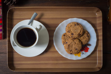 coffee cookie on table wood in the morning 