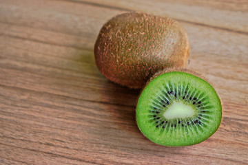 Closeup of kiwi on a wooden table