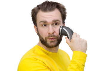 Naklejka premium man shaving beard