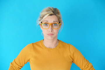 Portrait of blond woman with eyeglasses, isolated