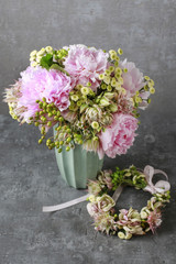 Bouquet of flowers: peony, matricaria and serruria florida (blus