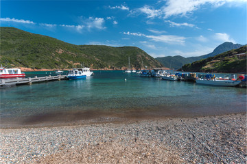 Fototapeta na wymiar Tiny port Girolata in the natural harbour