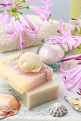 Obraz na płótnie Canvas Bars of handmade soap and shells