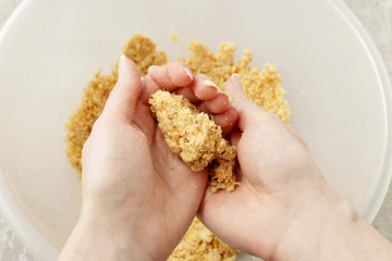How to make cake pops - round out the cake balls with your hands