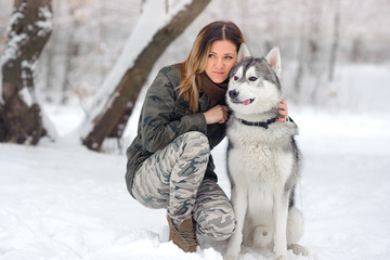 beautiful girl with huskies