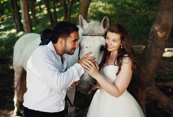 The brides walking with  horse