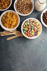 Obraz na płótnie Canvas Variety of cold cereals in white bowls