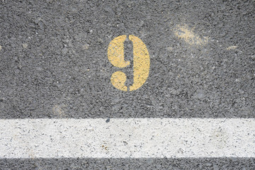 Road parking, Top view of asphalt road with signs as road markings on a street Labels No.9