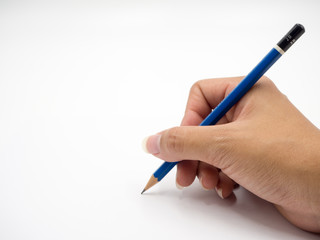 Human's hand holding pencil on white background