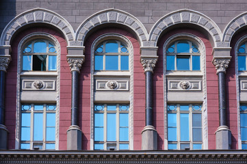 Obraz premium ancient architectural high rise building with windows and pillars