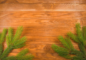  spruce twigs on the wooden table