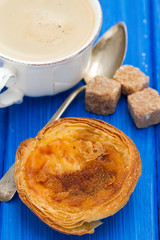 traditional egg tart pastel de nata with cup of coffee