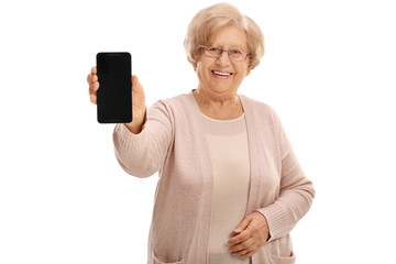 Joyful mature lady showing a phone