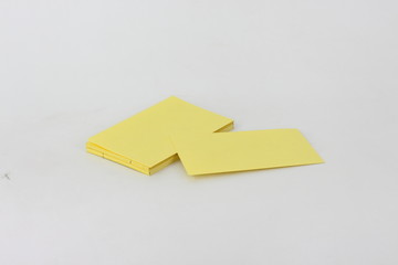 Yellow card on a white background.