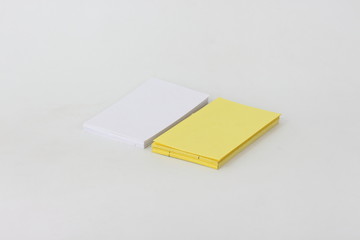Yellow card on a white background.