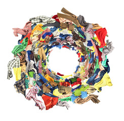Top view to whirlwind of clothes isolated on white background
