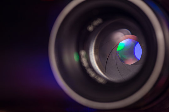 Camera lens with bokeh background.