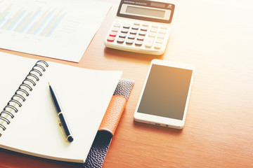 Office supplies for work on wooden table background